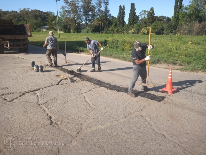 Colocacin de polvo de piedra y trabajos de bacheo