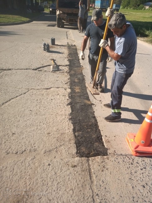 Colocacin de polvo de piedra y trabajos de bacheo